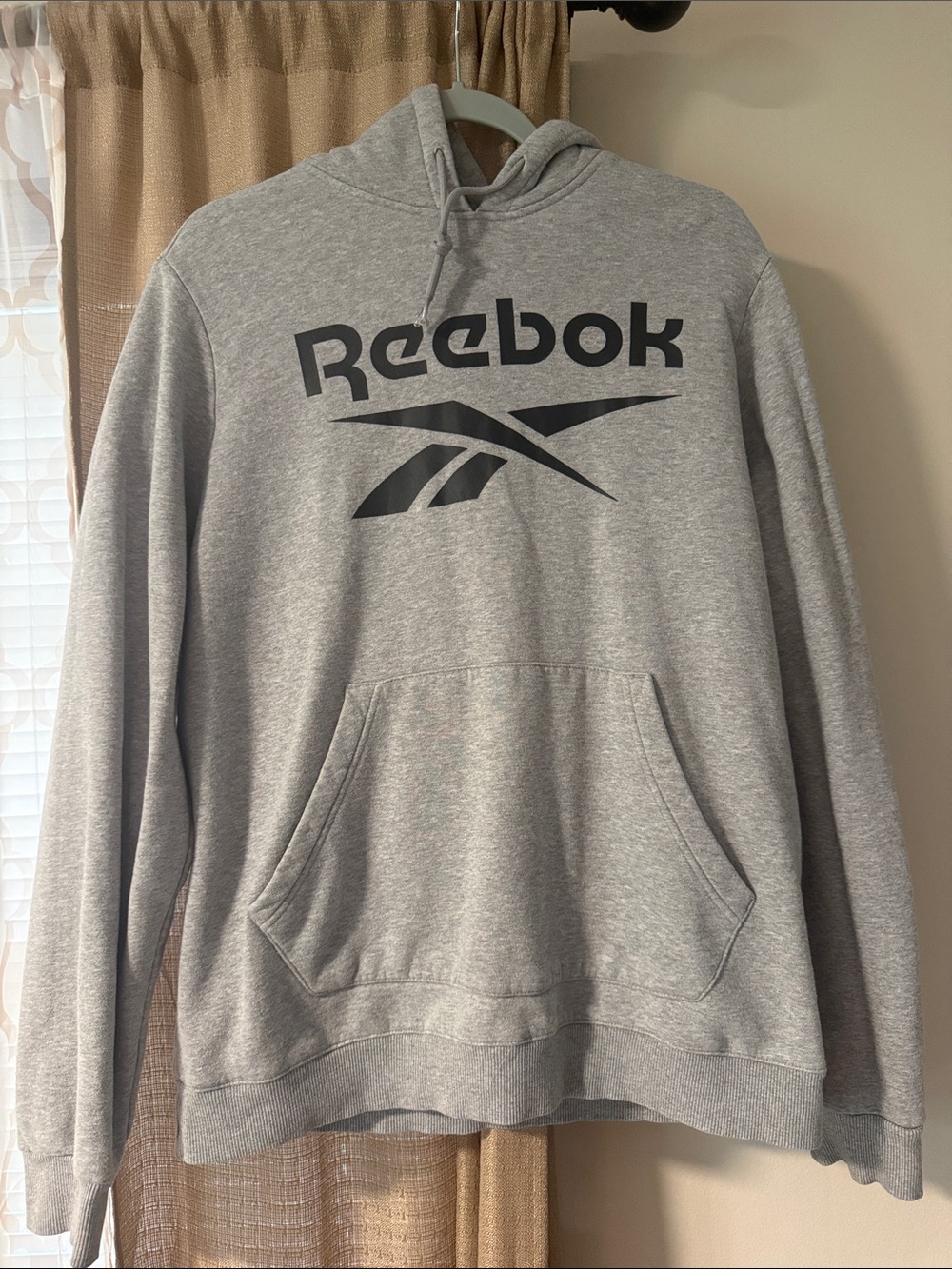 Reebok Men’s Light Gray Pullover Hoodie with Black Logo